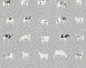 tapet med køer og prikker på med grå bund