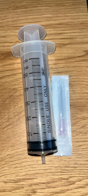 Limsprøjte med nål