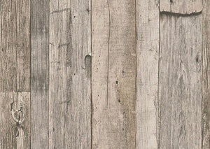 tapet i træ med drivtømmer med et look i brunlige og grålige farver